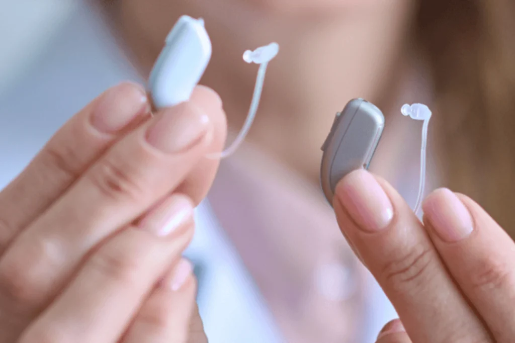 HAs-Woman holding Hearing aids